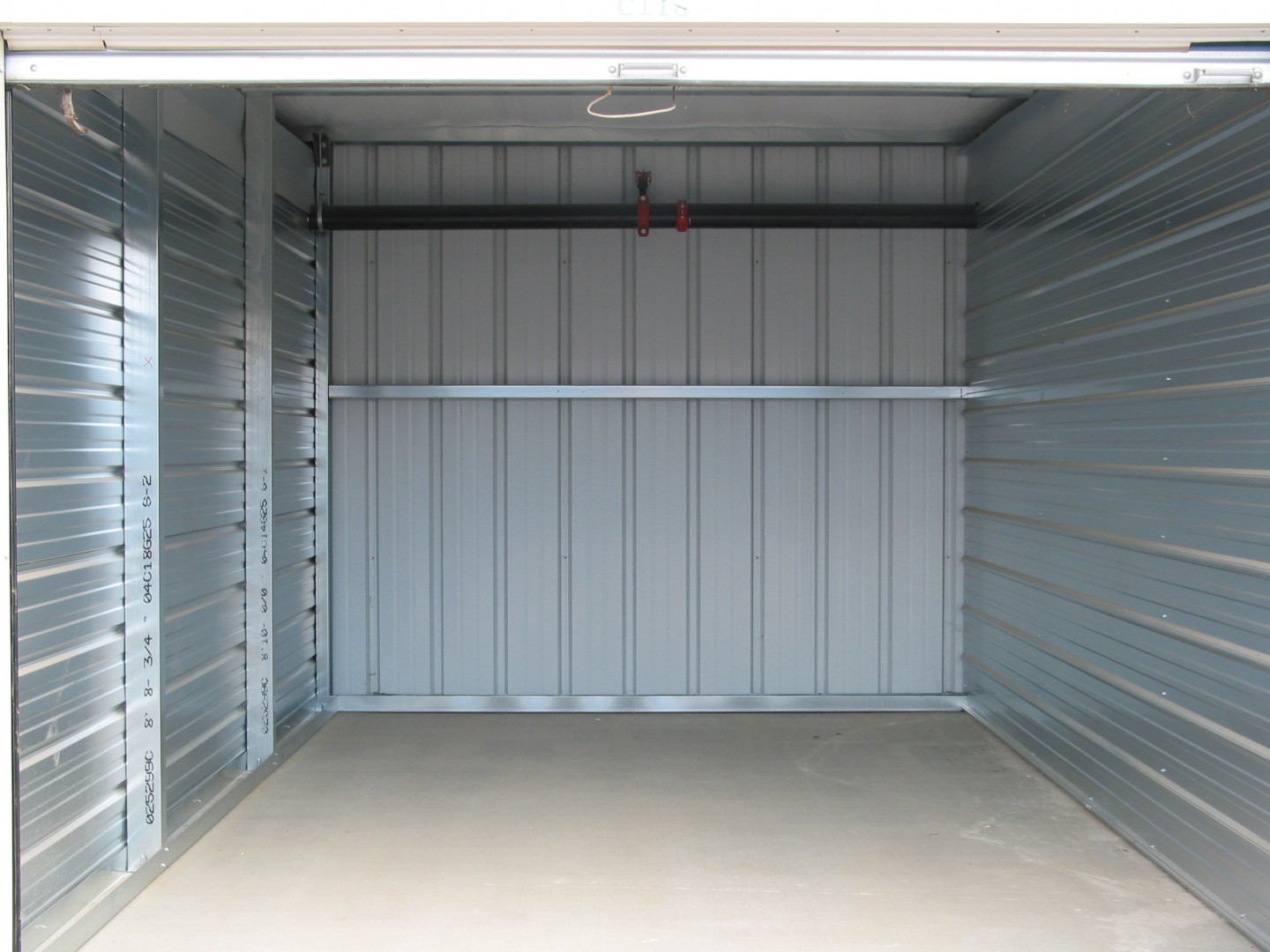 Spotless interior of an empty Stor All fixed storage unit